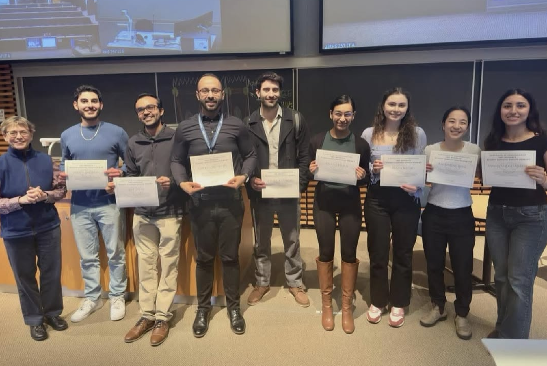 SLG leaders receiving a letter of appreciation